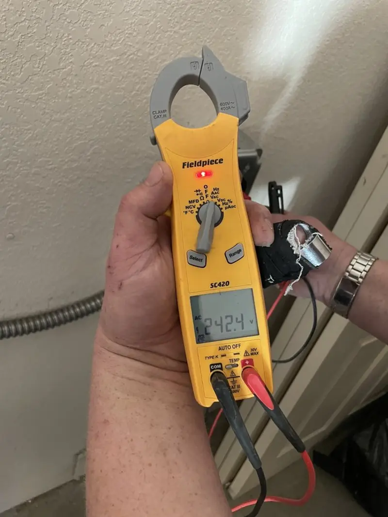 Voltage testing with clamp meter during Generator Installation in East Franklin